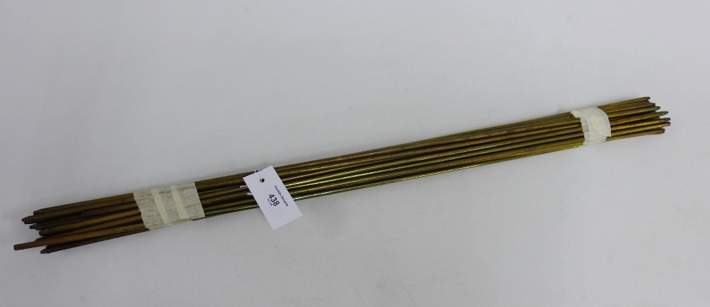 Collection of twenty one brass stair rods ranging in size from 60cm - 76cm, (21)