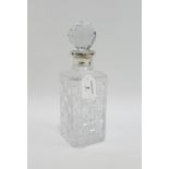 Silver collared and cut glass spirit decanter and stopper by Harrods, Ltd, London 1968, 27.5cm high
