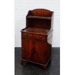 Mahogany cabinet with a single drawer above a cupboard door on bracket feet, 111 x 52cm