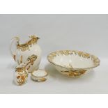 Doulton Burslem 'Iris' patterned toilet set comprising basin, ewer, vase, soap dish and drainer