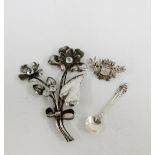 Ypres white metal brooch, paste set floral brooch and a Sterling silver salt spoon (3)