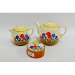 Clarice Cliff 'Crocus' patterned teapot, cream jug and sugar bowl with printed backstamps and