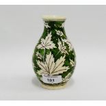 Middle Eastern pottery baluster vase with leaf pattern, 14.5cm high