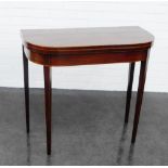 Mahogany foldover card table on tapering legs, 76 x 85cm