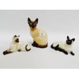 Sylvac Siamese cat, model number 5111, together with two Beswick Siamese cats, tallest 23cm, (3)