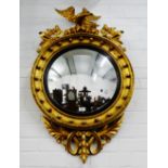 Georgian style circular wall mirror with convex plate surmounted by an Eagle with ball finials to