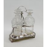 Glass triple decanter and stopper set, complete with Epns stand