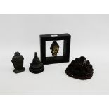 Mixed lot to include two Buddha heads, a Temple and a hardwood wall mask, (4)