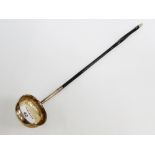 19th century toddy ladle with white metal bowl and twisted whale bone handle 40cm long