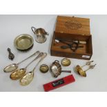 A mixed lot to include a vintage corkscrew, Epns berry spoons, silver ladle (a/f) and a Swan