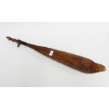 Dayak wooden harp, with carved head detail, 77cm long