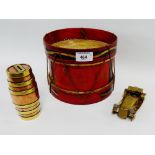 Painted drum, together with a brass and copper barrel money bank and a miniature brass car, (3)