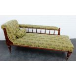 Mahogany framed chaise longue with spindle gallery back and upholstered in pineapple patterned