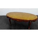 Oval coffee table on cabriole legs, 42 x 122cm