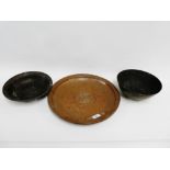 Two Chinese brass bowls and a copper charger, (3)