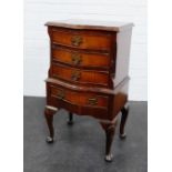 Mahogany bedside with four drawers, cabriole legs and pad feet, 76 x 64cm