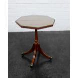 Mahogany octagonal side table on a turned column, 52 x 42cm