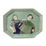 A Soviet faience biscuit plate "Accordion Players" Konakovo Faience Factory, Tver, circa 1930