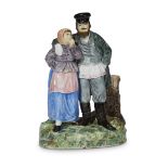 A Russian porcelain group "Peasant Couple" M.S. Kuznetsov Manufactory, Tver, 1889-1917 Impressed