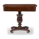 A William IV figured mahogany folding games table circa 1830-40 H: 31 1/2, W: 37, D: 18 in. (closed)