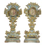 A pair of Italian Baroque polychromed walnut and pine reliquaries 18th century Each centered by a