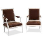A pair of Louis XVI white-painted fauteuils à la reine upholstered in chocolate silk velvet circa