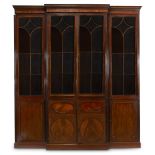 A George III figured mahogany breakfront bookcase late 18th/early 19th century One small glass