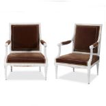 A pair of Louis XVI white-painted fauteuils à la reine upholstered in chocolate silk velvetcirca