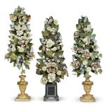 Three giltwood and tôle peinte floral garnitures late 19th century Comprising a pair with giltwood