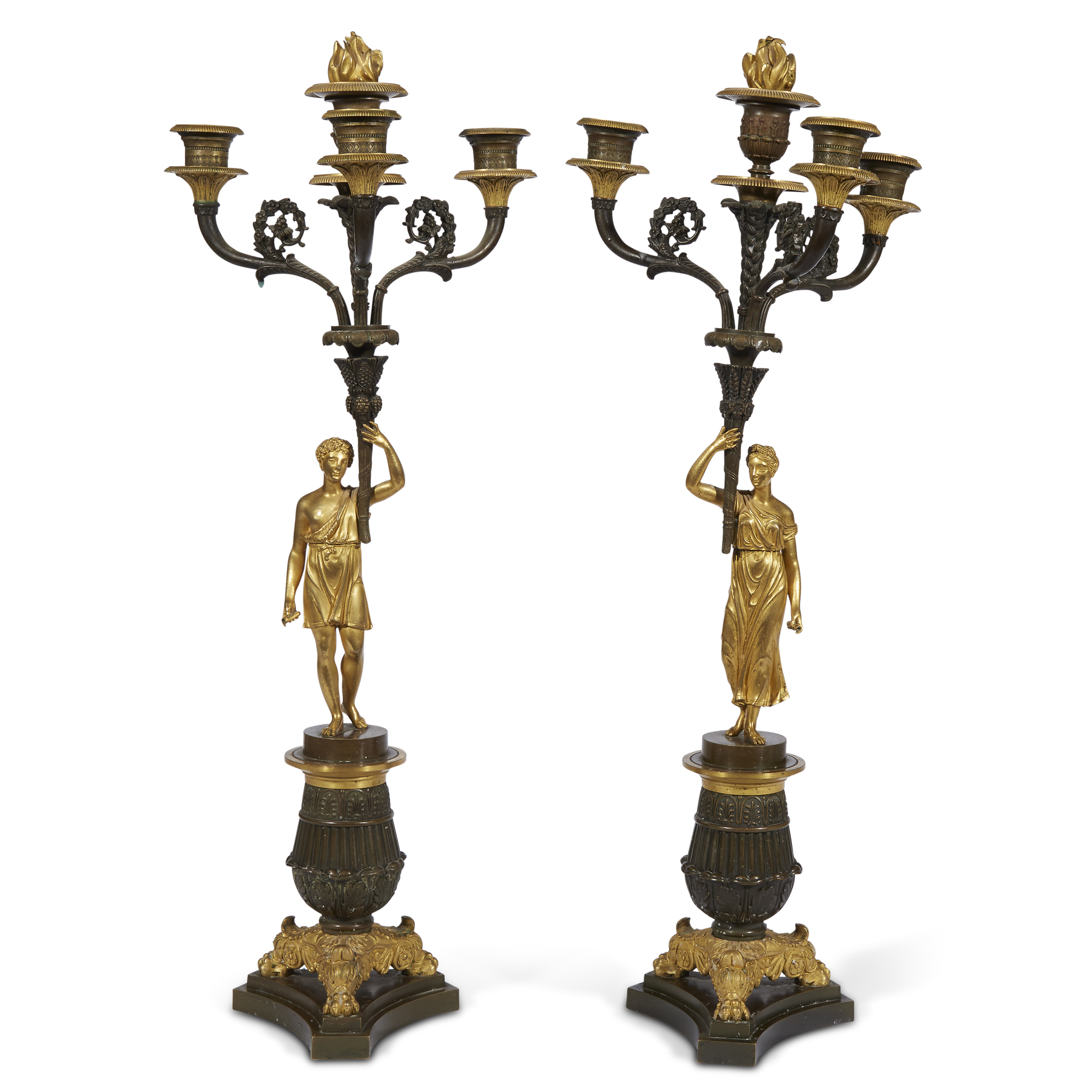 A pair of Louis Philippe ormolu and patinated bronze figural three-light candelabra circa 1830-40 H: