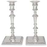 A pair of George III Sterling silver candlesticks Jonathan Alleine, London, 1766 The gadrooned