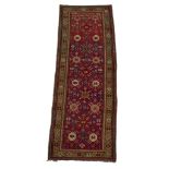 An Armenian long rug 20th century 11 ft. 2 in. x 9 ft. 1/2 in.