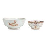 Two Chinese export porcelain bowls 19th century The smaller a famille rose floral-decorated bowl,