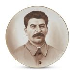 A Soviet cabinet plate with portrait of Joseph StalinDmitrovsk Manufactory, Verbilki, 1935 The plate