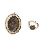 A Georgian mourning ring and pendant late 18th century The ring with encased hairwork and inscribed,