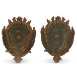 A pair of Italian Rococo trompe l'oeil painted wall appliques 18th century In the shape of