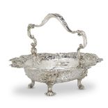 A fine George II sterling silver swing-handled cake basketWilliam Cripps, London, 1749 With yoke-