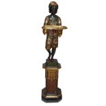 A large Venetian polychromed figural pedestal in the form of a young server late 19th/early 20th
