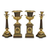 An Empire style gilt and patinated bronze four-piece garniture late 19th/early 20th century