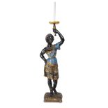 A Venetian polychromed figural torchère 19th century Now wired as a lamp. H: 45 in. (overall)