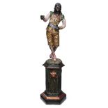 An unusual Venetian pink polychromed figural torchère on pedestallate 19th/early 20th century H: