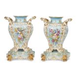 A pair of Jacob Petit hand-painted and parcel-gilt porcelain vases on stands circa 1840-50 Each