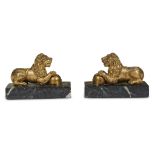 A pair of gilt-bronze recumbent lionspossibly Venice, early 18th century The recumbent lions with