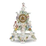 A Meissen porcelain figural mantel clock emblematic of the Four Seasons 1815-1860 In two parts,