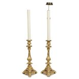 A pair of Renaissance Revival gilt-bronze candlesticks late 19th century Now wired as lamps. (2). H: