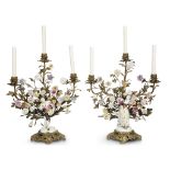 A pair of Meissen style porcelain-mounted gilt-bronze figural three light candelabra late 19th/early