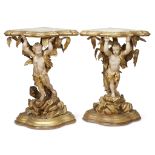 A pair of Italian Rococo carved giltwood and gesso figural corner consoles 18th century Each with