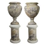 A pair of monumental Italian breccia di Medici marble urns on pedestals 19th century The breccia