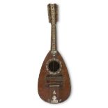 A Neapolitan bone, mother-of-pearl, and specimen wood inlaid spruce and Italian cypress mandolin