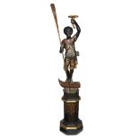 A Venetian polychromed figural torchère on pedestal 19th century H: 73 in. PROVENANCE: Property of a